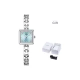 Серебряный корпус, синий циферблат.