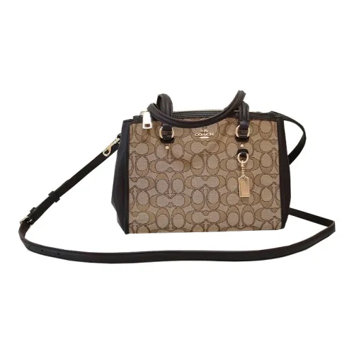 COACH Stanton Клатчи Женские