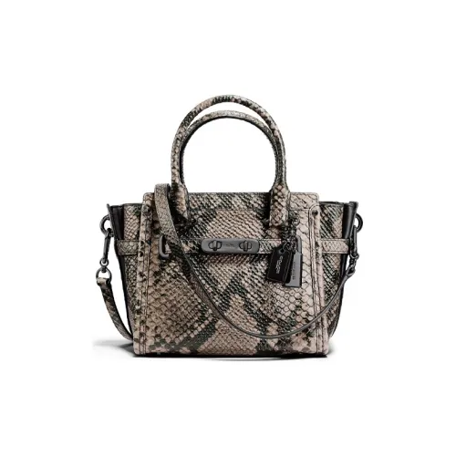 COACH Swagger Клатчи Женские