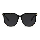 Оправа из черепахи с серыми линзами.