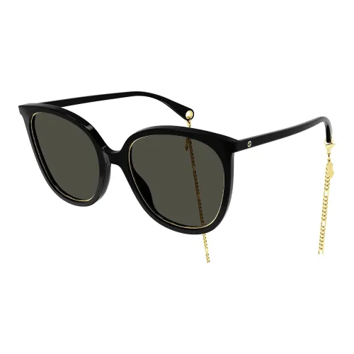 GUCCI Солнцезащитные очки Женские