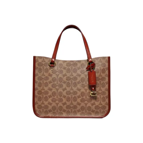 COACH TYLER Сумки-клатчи Женские