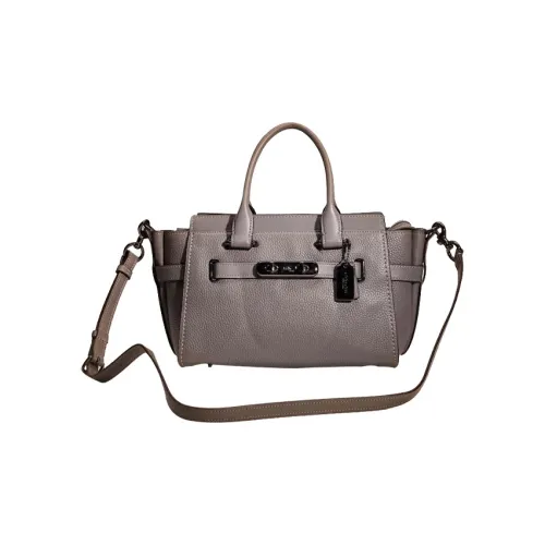 COACH Swagger Клатчи Женские