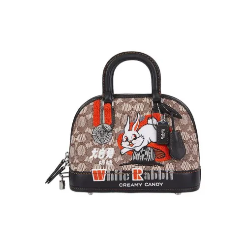 COACH Revel Клатчи Женские