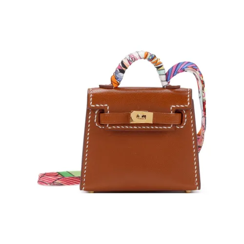 HERMES Kelly Twilly Tadelakt Bullock Кожа Украшение Сумка Merchandise Унисекс Золотисто-коричневый