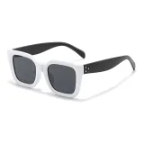 Белая оправа с серыми линзами.