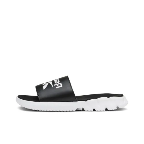 Reebok Ztaur Резиновая подошва Слипоны Унисекс Черный