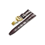 Золотистая пряжка, коричневая кожа