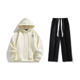 Комплект одежды (Абрикосовый свитшот + Черные джинсы с эффектом вымытого)