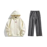 Комплект одежды (Абрикосовый свитшот + Черные и серые джинсы с эффектом утилизированных)