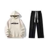 Комплект одежды (Абрикосовый топ + Черные джинсы)