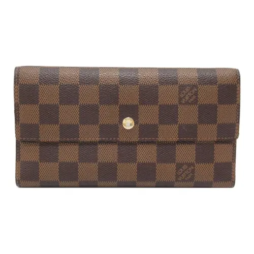 LOUIS VUITTON Кошельки Унисекс