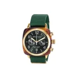 Золотой bezel с зеленым циферблатом