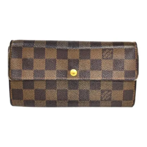LOUIS VUITTON Кошельки Унисекс