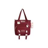 Красная сумка через плечо с брелком в виде кролика