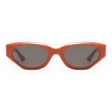 Оранжевая красная оправа с черными серыми линзами