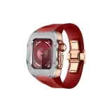 Серебряный bezel, розово-золотой корпус, красный ремешок.