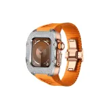 Серебряный круг, розово-золотой корпус, оранжевый ремешок.