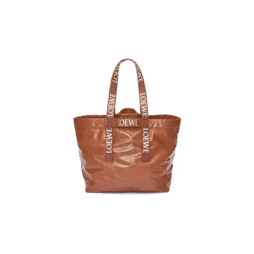 LOEWE Клатчи Унисекс