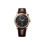 Розовый корпус, черный циферблат, коричневый кожаный ремешок.