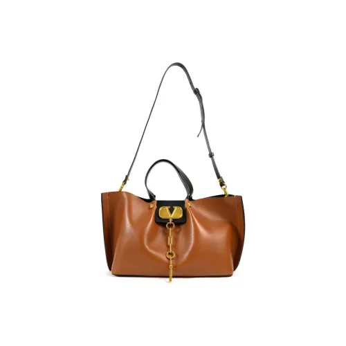 Valentino Garavani Кожа Сумка через плечо Сумка среднего размера Женская Коричневая