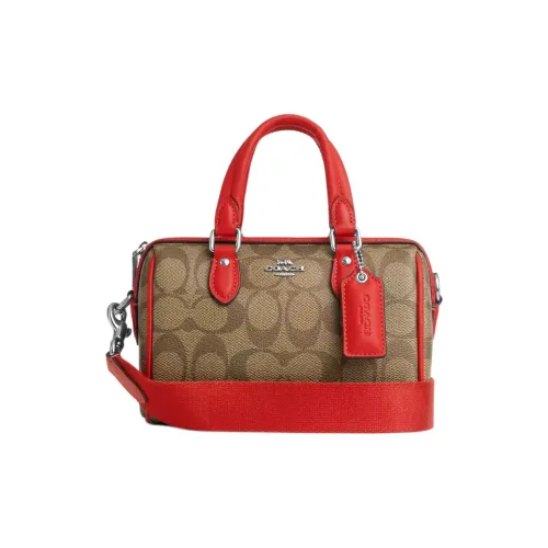 COACH Rowan Клатчи Женские