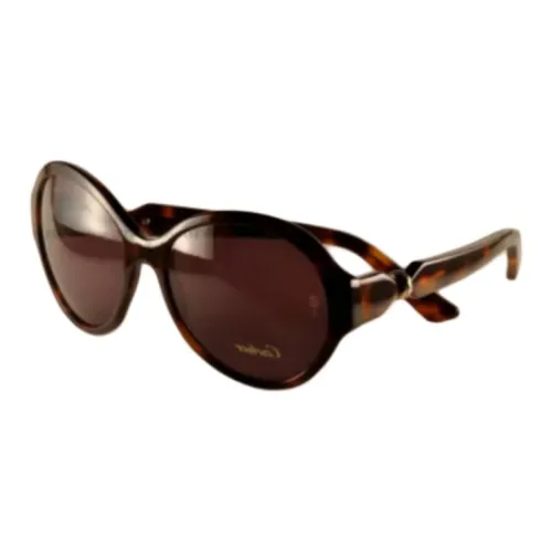 Cartier Пластик OVAL SUNGLASSES Унисекс Черепаховый