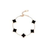 Браслет с четырехлистным клевером