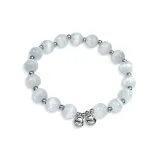 Браслет с бусинами и колокольчиком