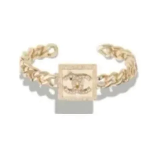 CHANEL Металлические браслеты золотые женские