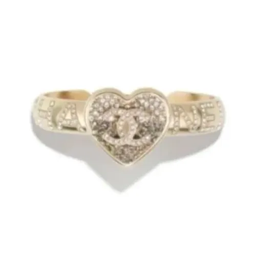 CHANEL Металлические браслеты золотые женские