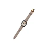 Личи зернистая текстура, кожа, золотая застежка-бабочка, абрикос