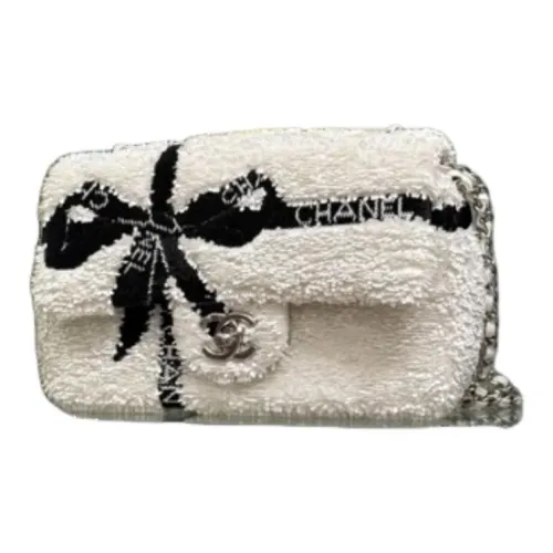 CHANEL Сумки через плечо Женские