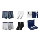 2 пачки нижнего белья: темно-серый + светло-серый, 2 пачки носков: черный + белый.