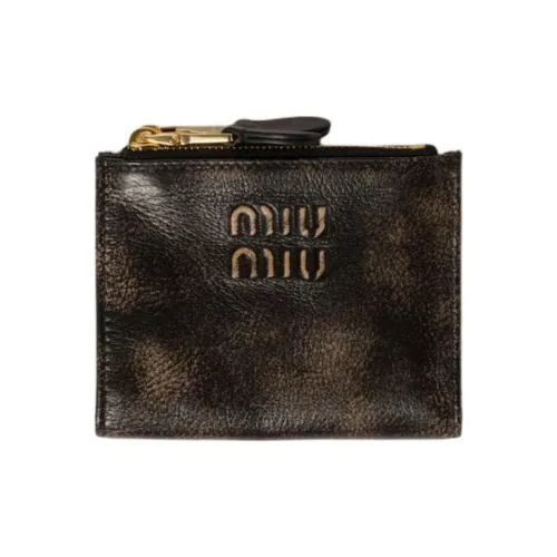 MIU MIU Кошельки Унисекс
