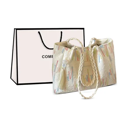 COMELY Сумки через плечо Экрю Женские