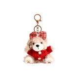 Плюшевый медвежонок цвета печенья с красным бантом