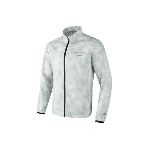 Skechers Куртки и Пальто Мужской Облачный Туман С принтом по всей поверхности Серый