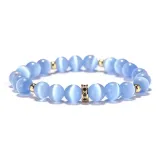 Синий браслет из бусин с символом удачи