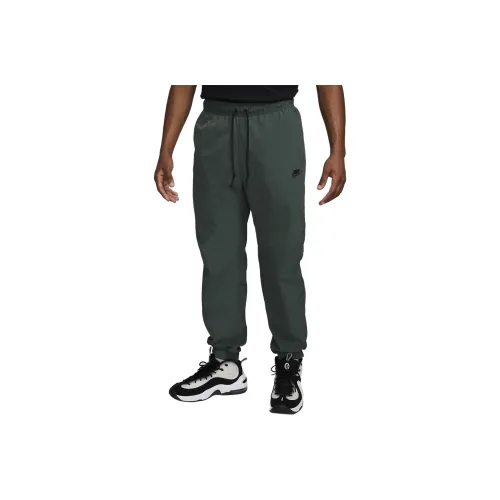 Nike Вязаные тренировочные штаны Мужские Винтажный зеленый черный