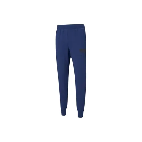 PUMA Rebel Брюки Cl TR Вязаные Тренировочные брюки Мужские Electronic Синий