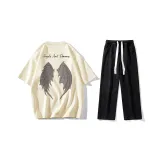 Комплект (Абрикосовая футболка + черные джинсы)