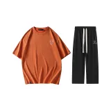 Комплект одежды (Оранжевый топ + черные штаны)