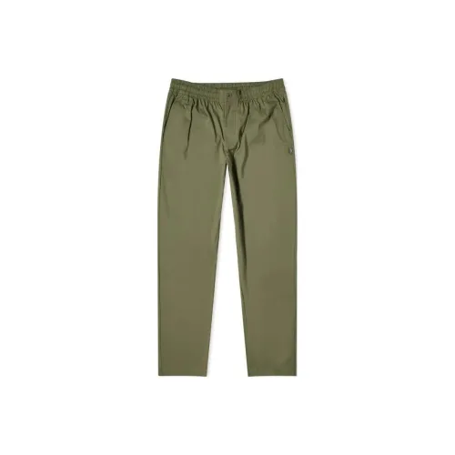 New Balance Повседневные брюки Мужские Темно-оливково-зеленые
