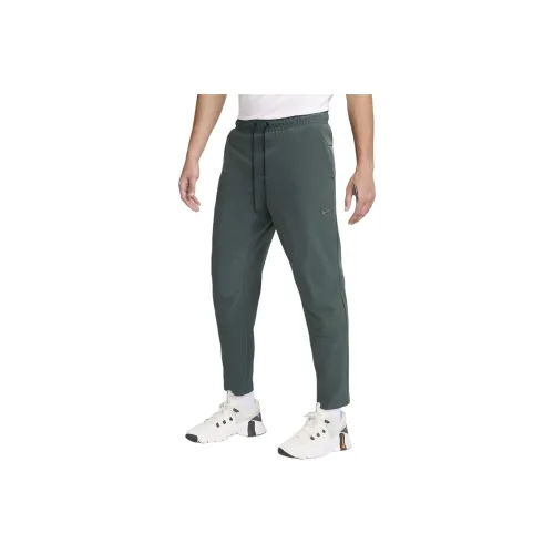 nike Unlimited Повседневные брюки Мужской Винтажный зеленый Черный
