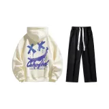 Комплект одежды (Абрикосовый свитшот + Черные джинсы с эффектом вымытого)