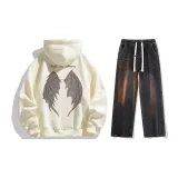 Комплект одежды (Абрикосовый топ + Черные джинсы)