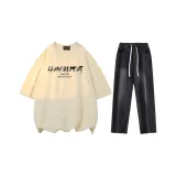 Комплект (абрикосовый топ+черные брюки)