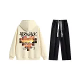 Комплект одежды (Абрикосовый топ + Черные джинсы)