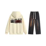 Комплект одежды (Абрикосовый топ + Черные джинсы)